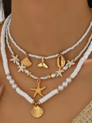Collares tendencia 2026 dorado y blanco de mar